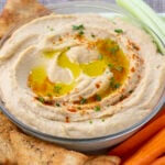 Bowl of Hummus with Pita Chips, Carrots, and Celery. Hummus, hummus Recipe, homemade Hummus, Homemade Hummus recipe, Best Hummus, Making Hummus, Chip Dip, Vegetable Dip, Veggie dip, Chickpeas, Garbanzo Beans, Tahini, Dip, Appetizer, Cold Appetizer, Cold Dip, Dairy Free, Dairy Free Dip, Dairy Free Appetizer, Vegan, Vegan Dip, Vegan Appetizers, Easy Appetizer, Easy Dip, hummus good for you, hummus healthy, Healthy Dip Recipes, Healthy Appetizer Recipes, Healthy Food, Real Food, Real Food Recipes, Healthy Food Recipes, Wholesome food, Wholesome food recipes, Whole Food, Whole Food Recipes, Realgood food, Realfooddaily Eat real, Good Real Food, Goodrealfood,