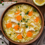 An overhead image of lemon chicken orzo soup.