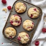 A tin of raspberry muffins.