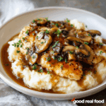 chicken marsala in a white bowl.