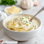 A bowl of fettuccine Alfredo with homemade Alfredo sauce.