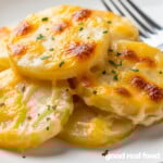 A plate of scalloped potatoes.
