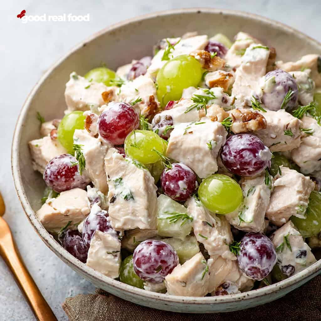 A bowl of grape chicken salad.