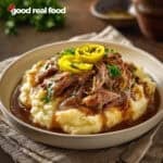Mississippi Pot Roast served over mashed potatoes.
