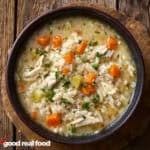 A bowl of chicken and rice soup.