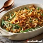 Green Bean Casserole in a white baking dish.