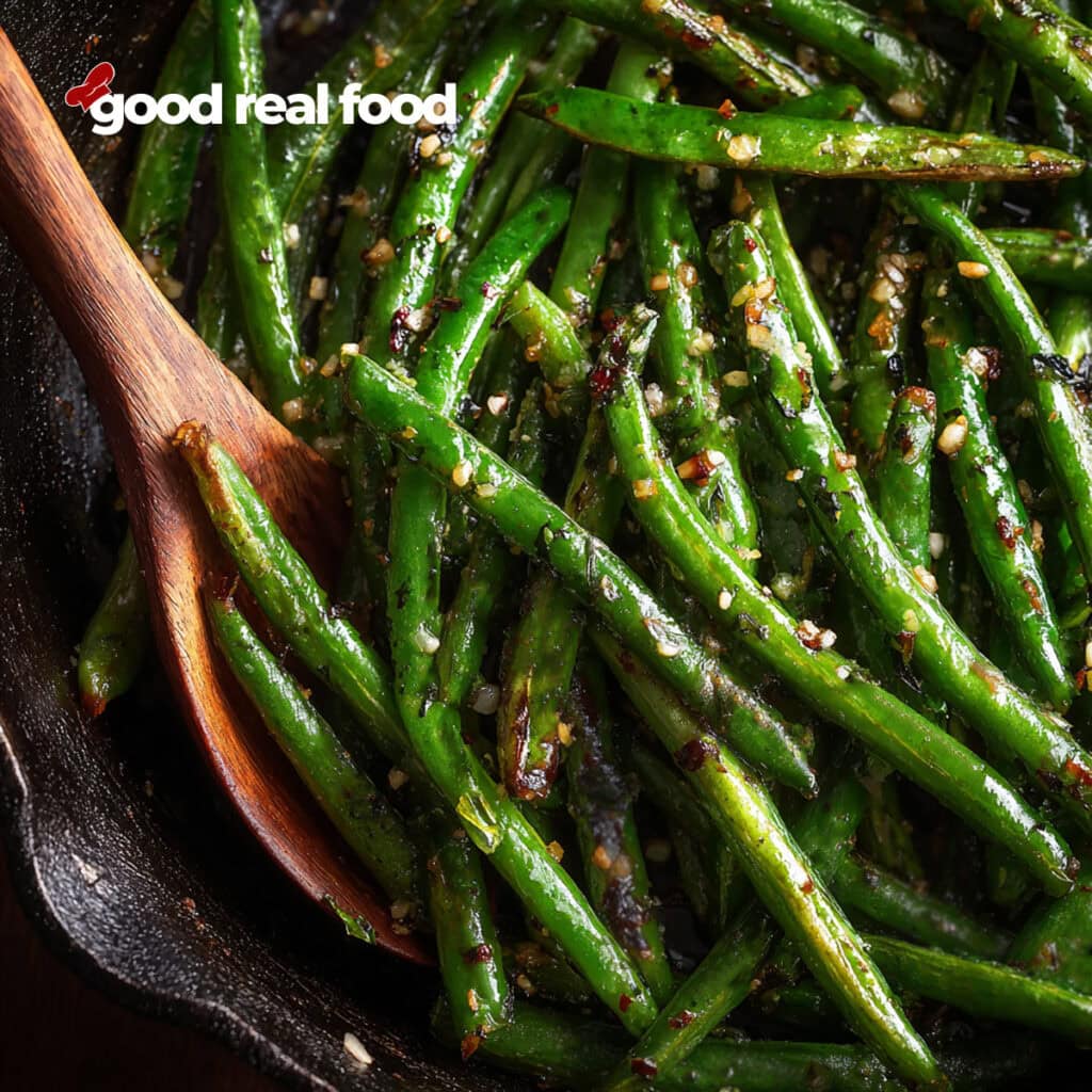roasted green beans in a skillet.