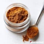 A small spice jar filled with homemade pumpkin pie spice.
