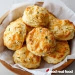A basket of cheddar garlic biscuits.