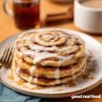 a plate of cinnamon roll pancakes.