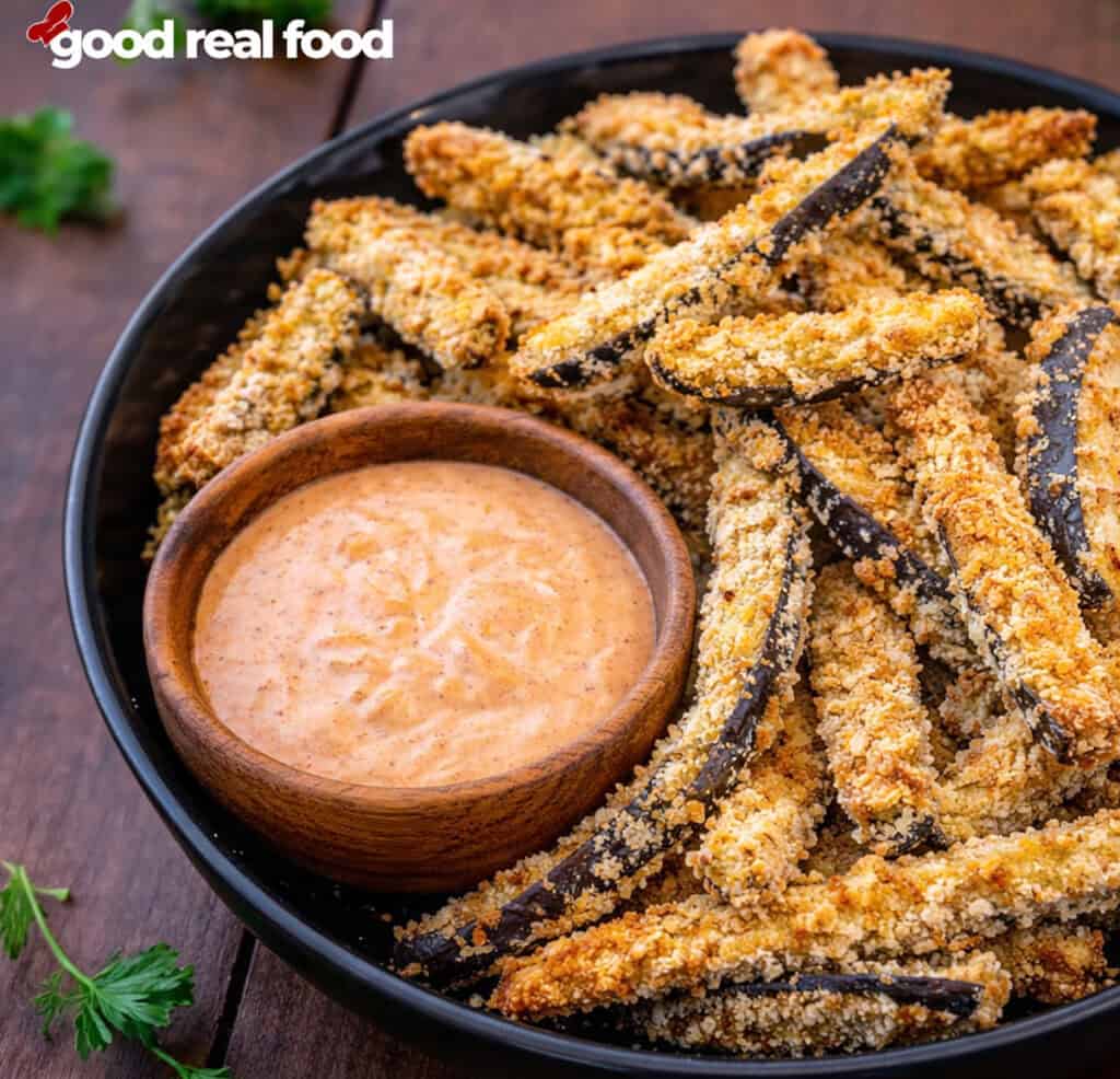 a black bowl of eggplant fries.