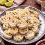 A plate of fiesta pinwheels.