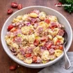 Italian Grinder Tortellini Salad in a white bowl.