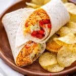 A buffalo chicken wrap on a plate.