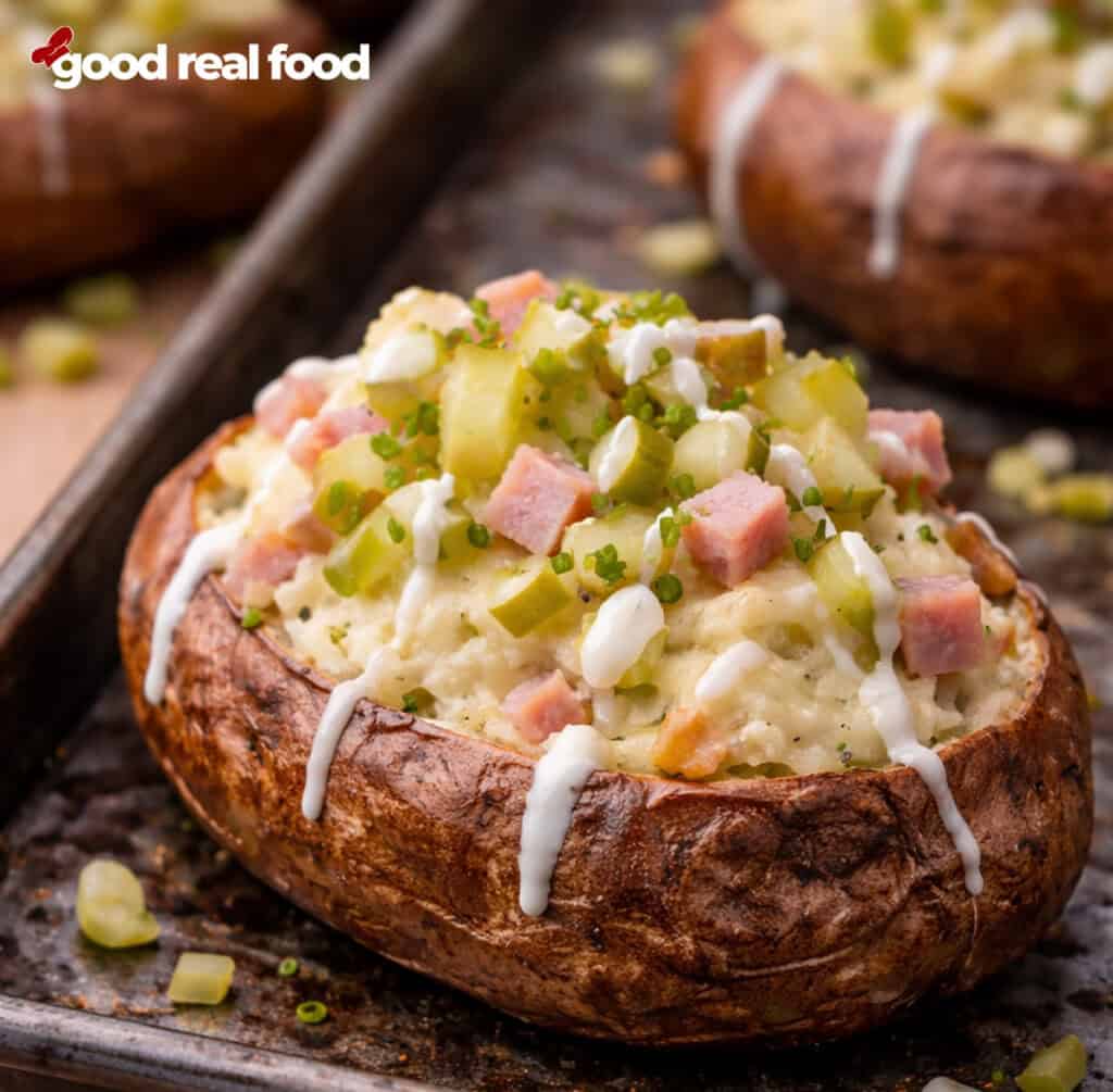 Ham and Pickle Twice Baked Potato on a sheet pan.