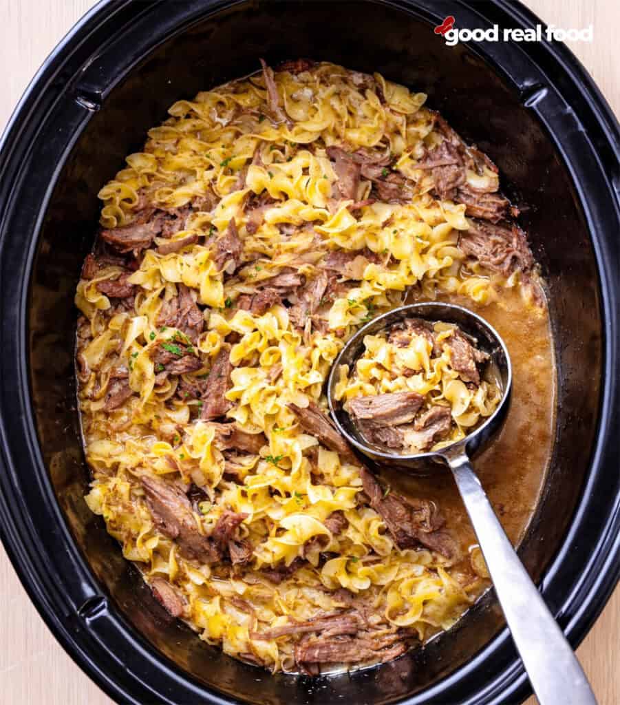 Slow cooker beef and noodles in the pot.