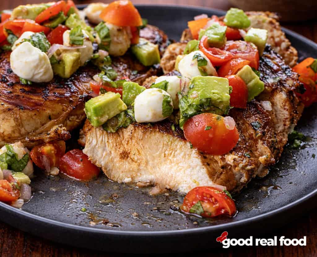 A plate of Balsamic Chicken with Caprese Salsa.