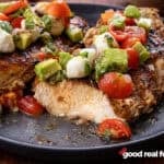 A plate of Balsamic Chicken with Caprese Salsa.