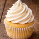Ermine Frosting piped onto a cupcake.