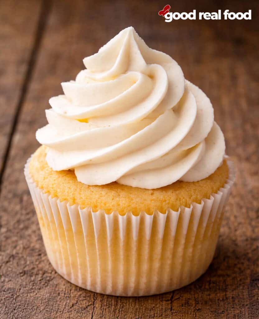 Ermine Frosting piped onto a cupcake.