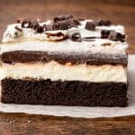 Chocolate Brownie Lush Dessert on parchment paper.