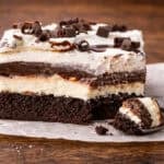 Chocolate Brownie Lush Dessert with a bite out.